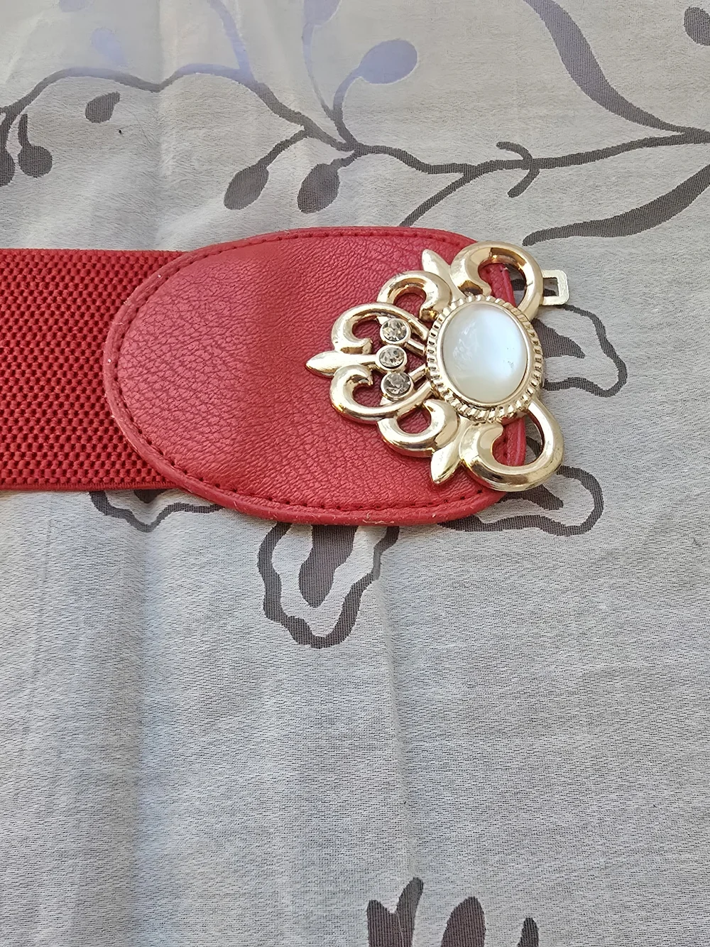 Red Elastic Waist Belt with Gold Floral Accent